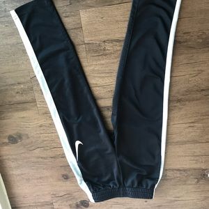 Boys Nike dri-fit pants. Size 7L. Black w White